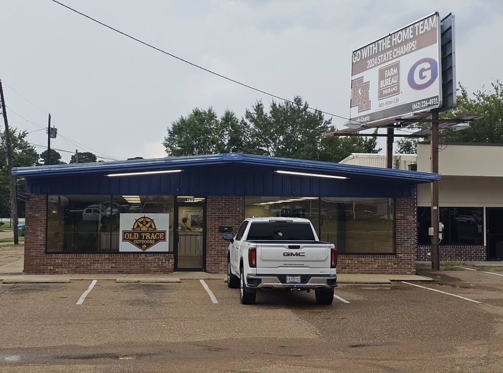 Grenada storefront with 590 visible on the building